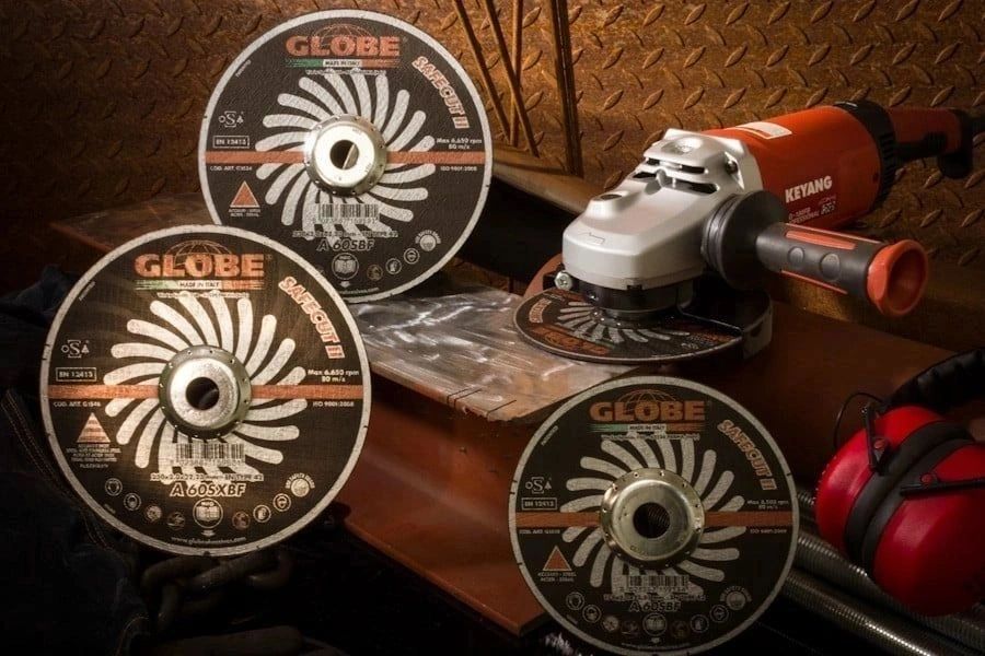 Industrial metalworking workshop with angle grinder